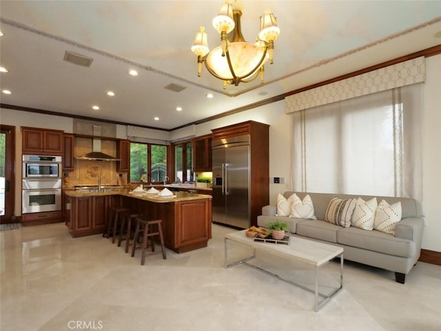 interior space featuring crown molding and an inviting chandelier