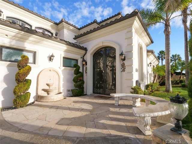 entrance to property with french doors