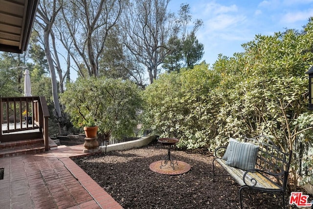 view of yard featuring a deck