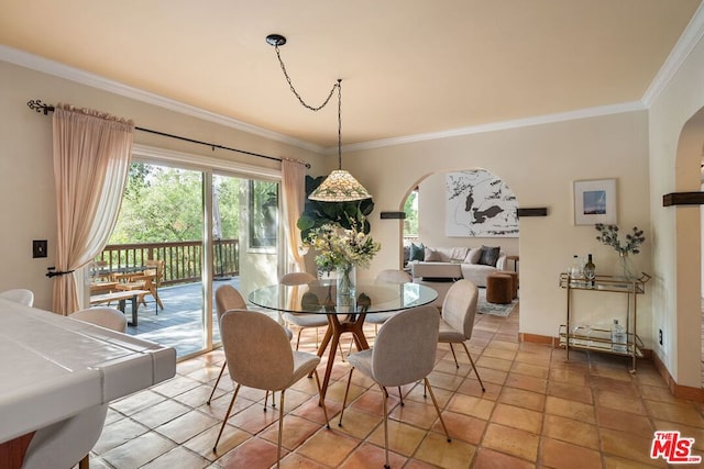 dining area with crown molding