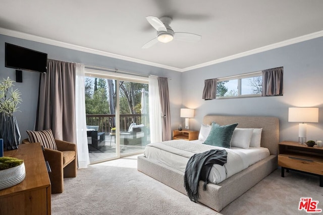 bedroom with crown molding, light colored carpet, multiple windows, and access to outside