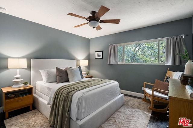 bedroom featuring ceiling fan