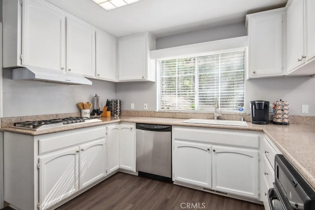 kitchen with sink, gas cooktop, stainless steel dishwasher, and white cabinets