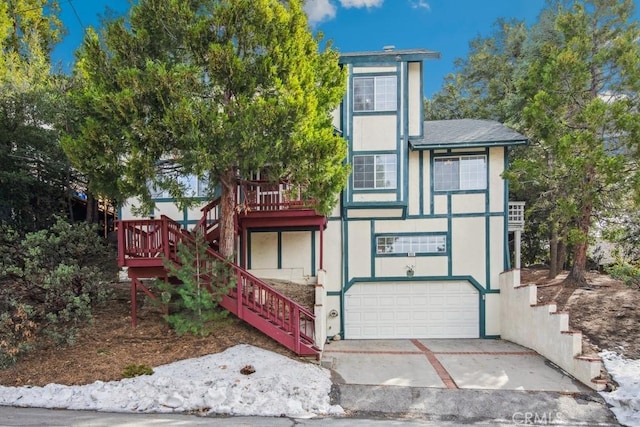 view of front of property with a garage