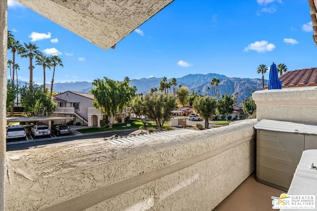 balcony featuring a mountain view