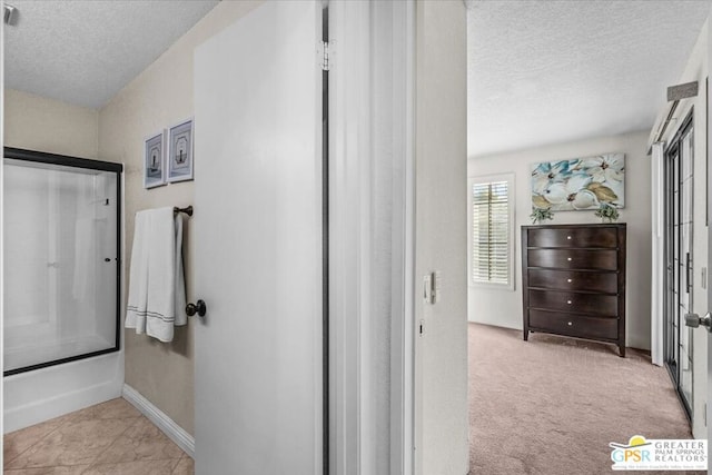 bathroom with a textured ceiling