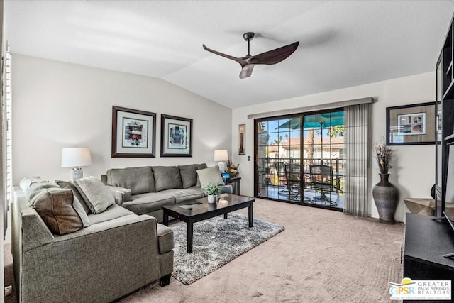 carpeted living room with lofted ceiling and ceiling fan