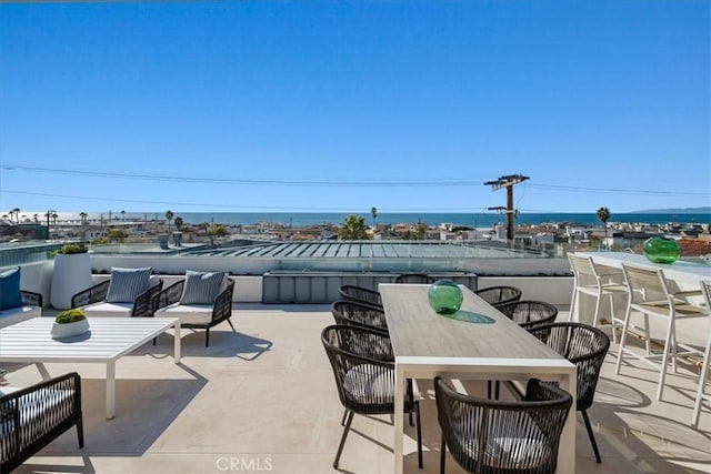 view of patio featuring a water view