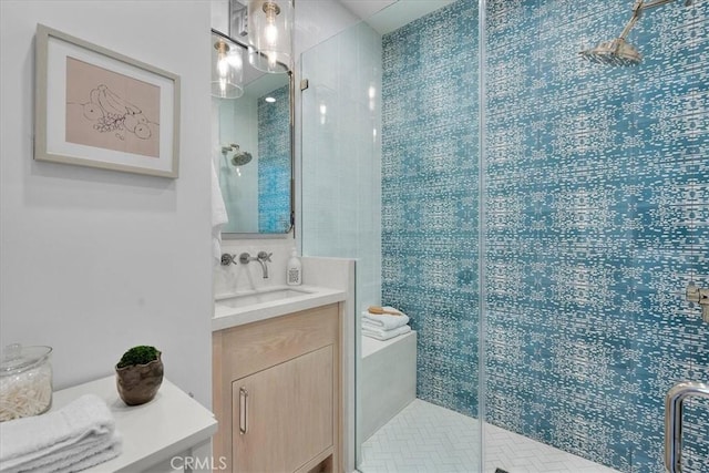 bathroom featuring vanity and walk in shower