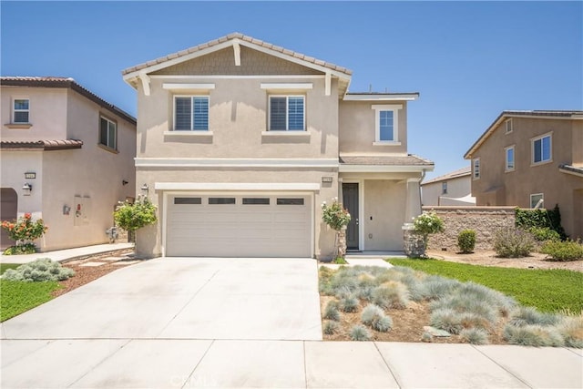 view of front of property featuring a garage