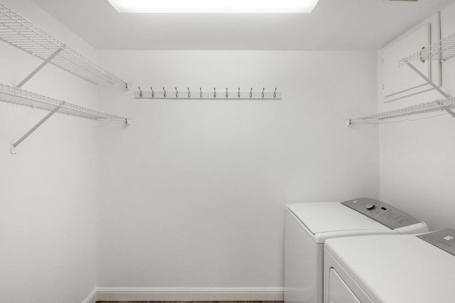 laundry room with washer and dryer