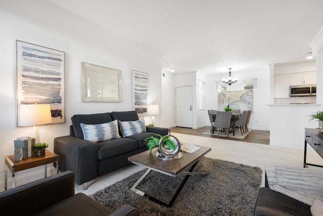 living room with a chandelier