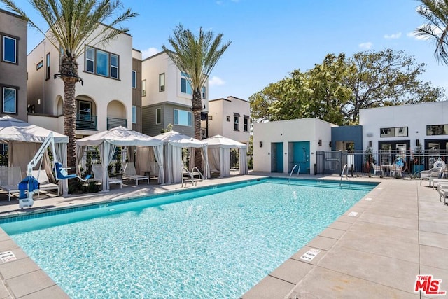 view of swimming pool featuring a patio