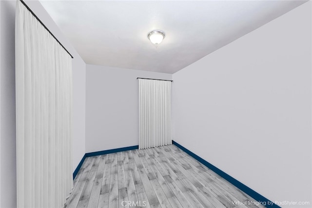 empty room featuring light wood-type flooring