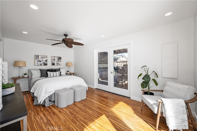 bedroom featuring access to outside, french doors, recessed lighting, and wood finished floors