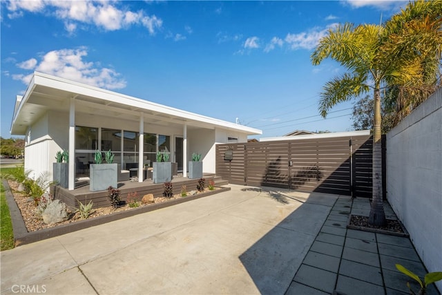 view of patio / terrace featuring fence