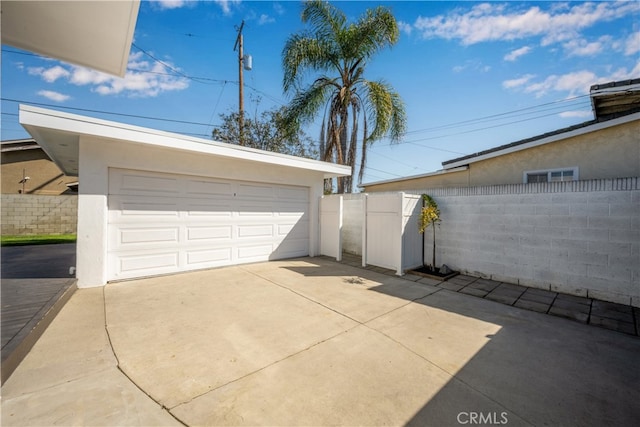 detached garage with fence