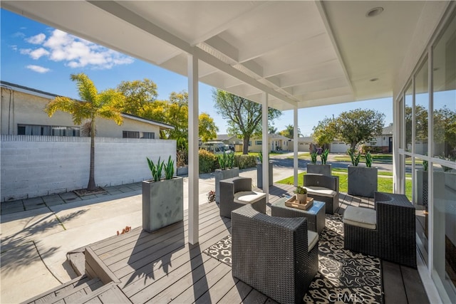 deck with a patio area, a residential view, and an outdoor hangout area