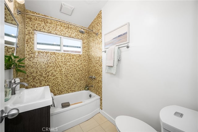 full bath with toilet, vanity, baseboards, tub / shower combination, and tile patterned floors