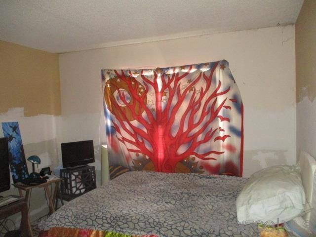 bedroom with a textured ceiling