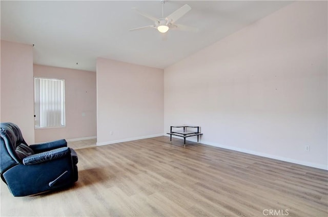 8566 Larkhall Cir Unit 809D, Huntington Beach, CA 92646 - living area featuring baseboards, light wood-type flooring, and ceiling fan