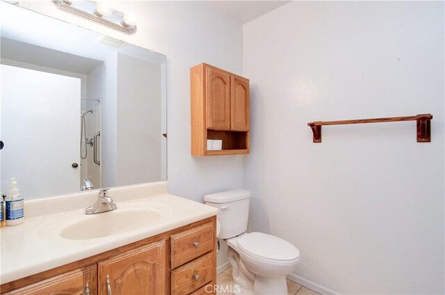 8566 Larkhall Cir Unit 809D, Huntington Beach, CA 92646 - full bath featuring vanity, toilet, a shower, and tile patterned flooring