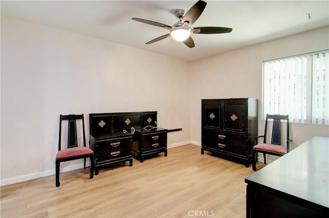 8566 Larkhall Cir Unit 809D, Huntington Beach, CA 92646 - office area featuring wood finished floors, a ceiling fan, and baseboards