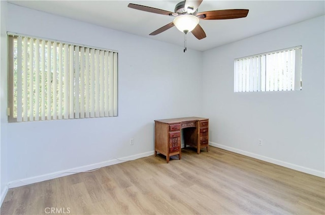 8566 Larkhall Cir Unit 809D, Huntington Beach, CA 92646 - empty room with wood finished floors, baseboards, and ceiling fan