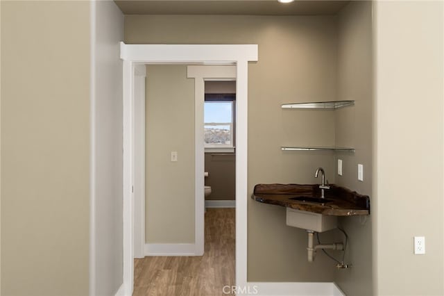 60785 La Brisa Dr, Joshua Tree, CA 92252 - hall with light wood-style flooring and baseboards