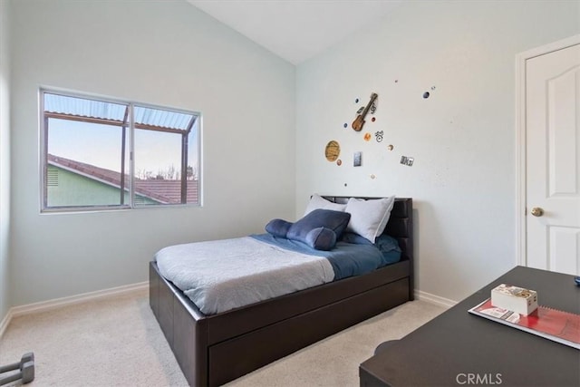 bedroom with light colored carpet