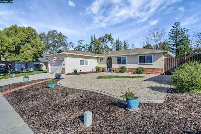 single story home with a garage