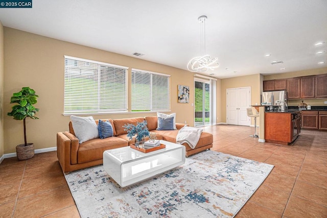 living room with light tile patterned flooring