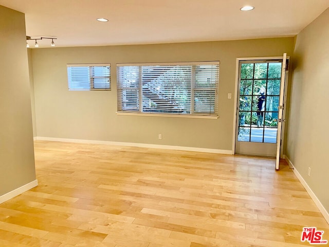 empty room featuring light hardwood / wood-style floors