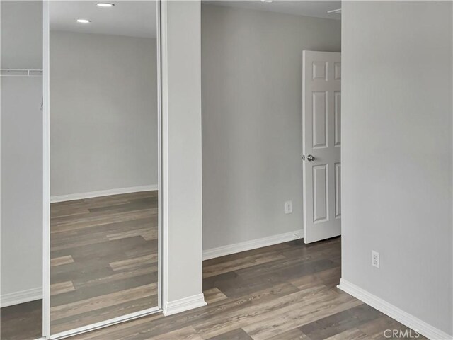 empty room featuring dark hardwood / wood-style floors