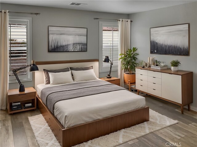 bedroom featuring hardwood / wood-style flooring