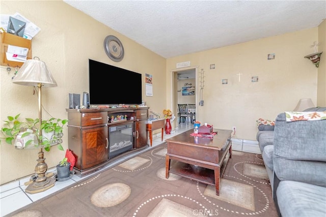 living room with a textured ceiling