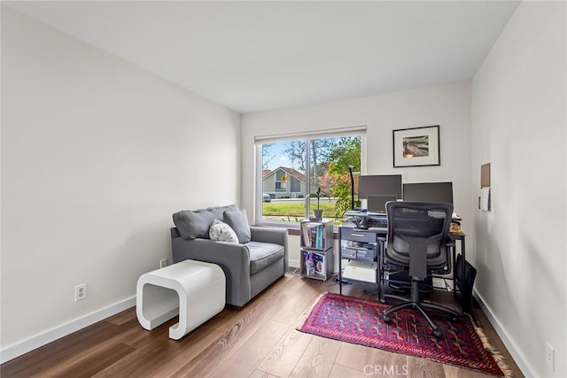 office with hardwood / wood-style flooring