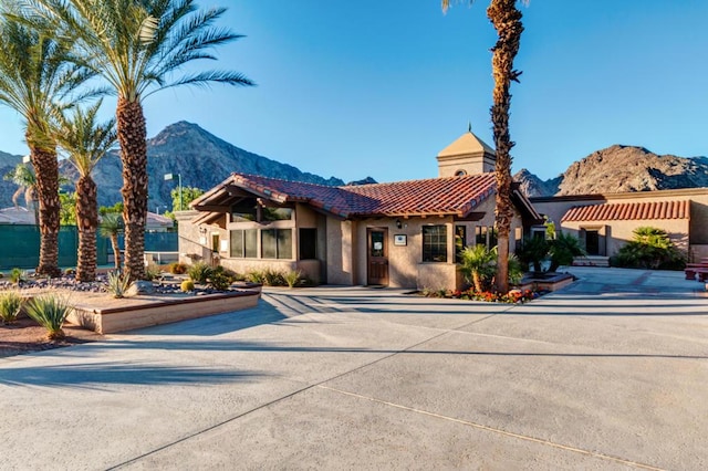 view of front of house with a mountain view