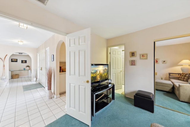 living room with light tile patterned floors