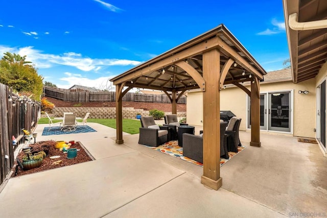 view of patio with a gazebo and outdoor lounge area