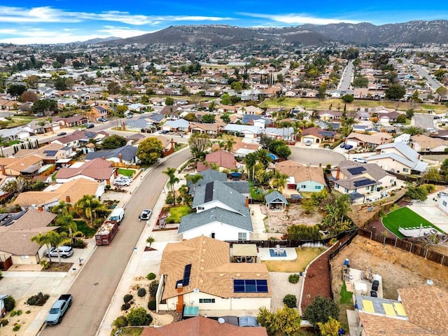 drone / aerial view featuring a mountain view