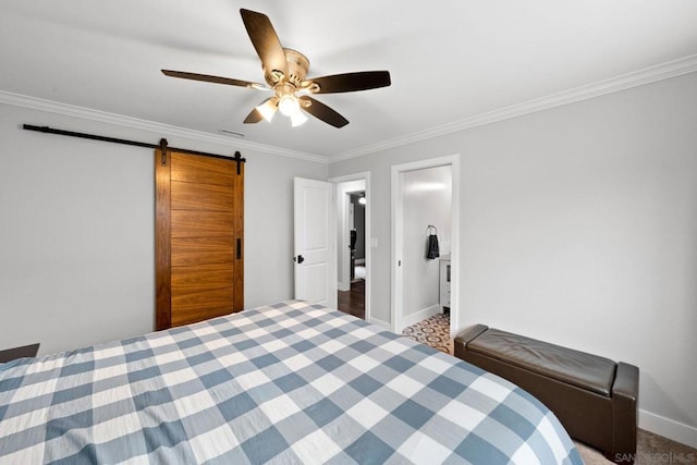 bedroom with ornamental molding, a barn door, carpet, and ceiling fan