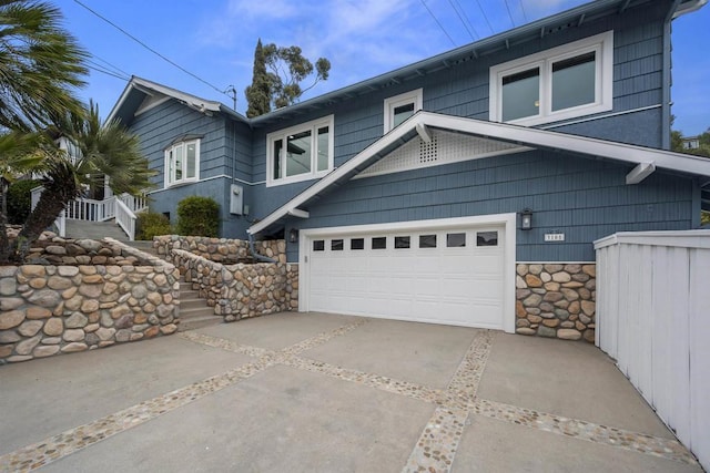 view of property exterior featuring a garage