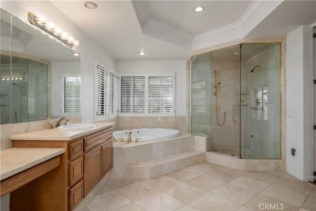 bathroom with vanity, ornamental molding, and shower with separate bathtub