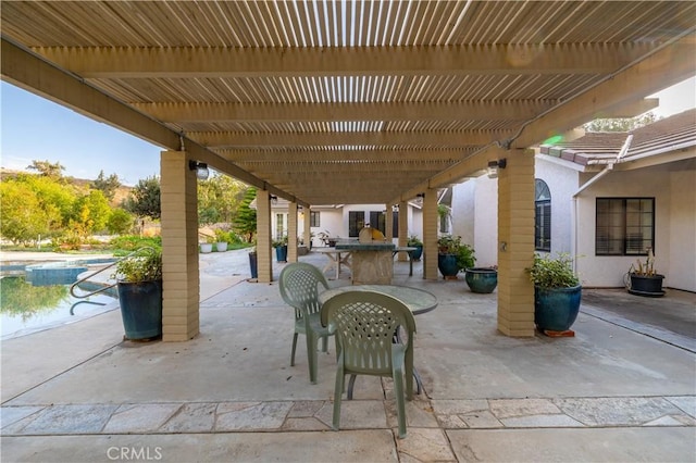 view of patio / terrace featuring a pergola