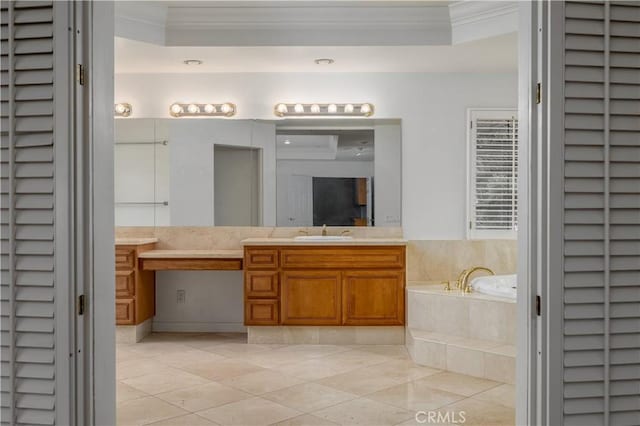 bathroom with ornamental molding, tile patterned flooring, vanity, and tiled tub