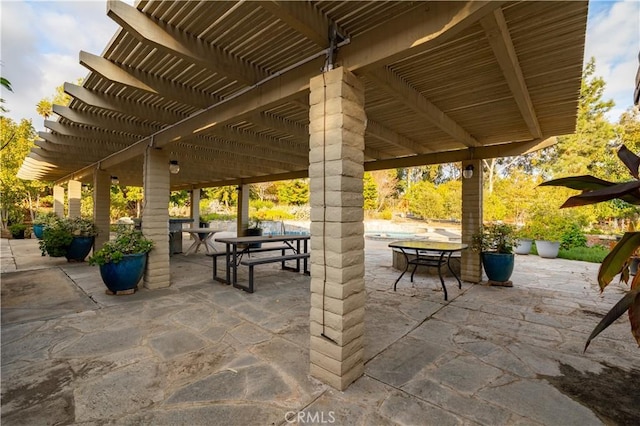 view of patio featuring a pergola