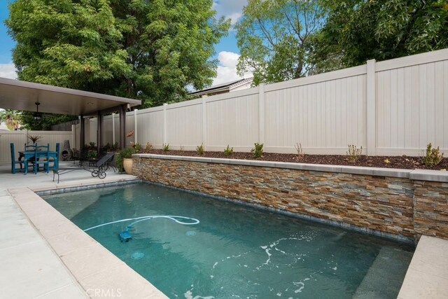 view of pool with a patio area