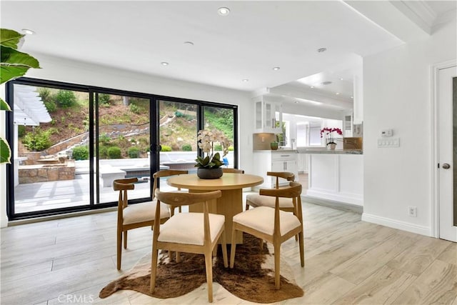 dining space featuring light hardwood / wood-style floors