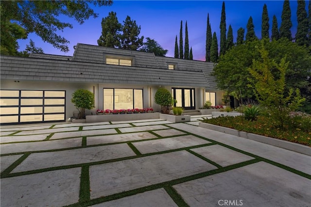 exterior space with a garage